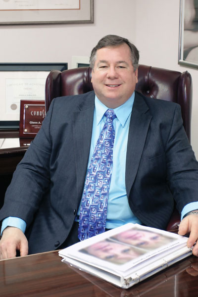 Dr. Glenn DeBias at his desk